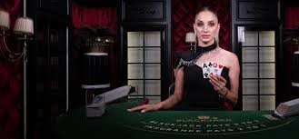 kucing4d Captain's Bounty live-dealer studio with card table and multi-camera broadcast setup